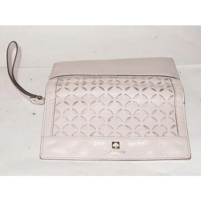 SALE! Kate Spade Pale Pink Leather With A Cut Out Design And Wrist Strap Wallet