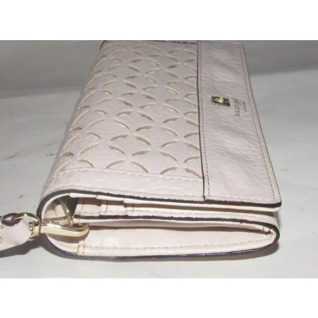 SALE! Kate Spade Pale Pink Leather With A Cut Out Design And Wrist Strap Wallet