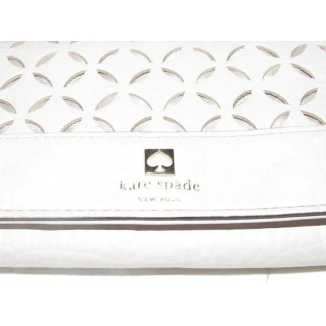 SALE! Kate Spade Pale Pink Leather With A Cut Out Design And Wrist Strap Wallet