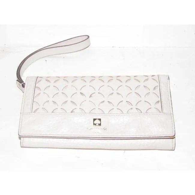 SALE! Kate Spade Pale Pink Leather With A Cut Out Design And Wrist Strap Wallet